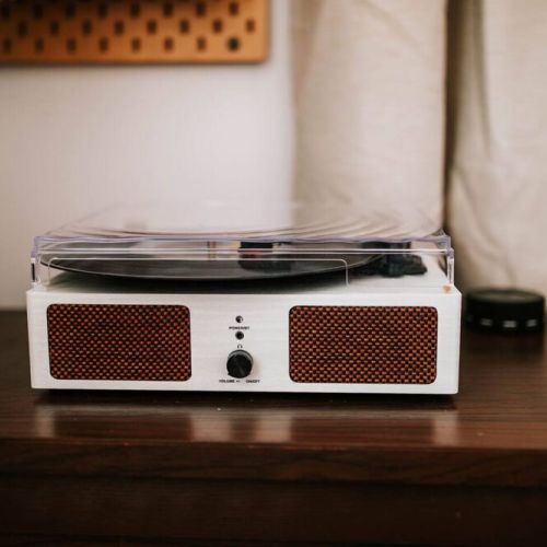 Unwind with your favorite shows on the expansive large-screen TV, or rediscover the magic of vinyl with our vintage record player.