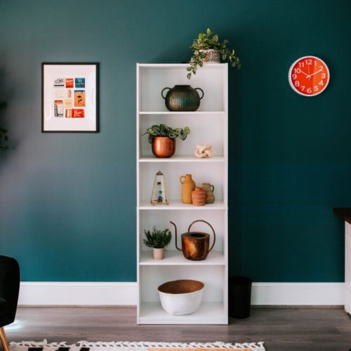 Stay inspired in this thoughtfully curated nook—where every shelf tells a story and productivity meets peace.