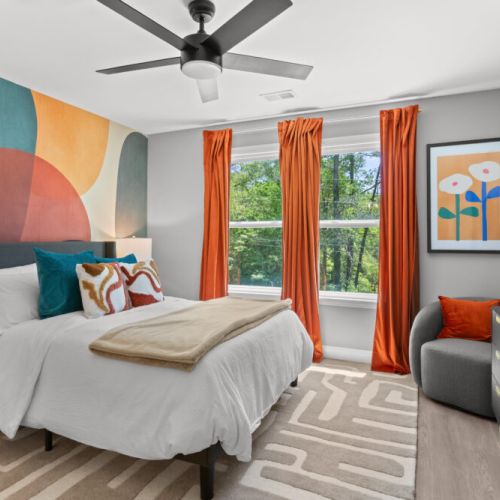 Wake up to color, comfort, and sunlight—this vibrant bedroom is where playful design meets peaceful rest.