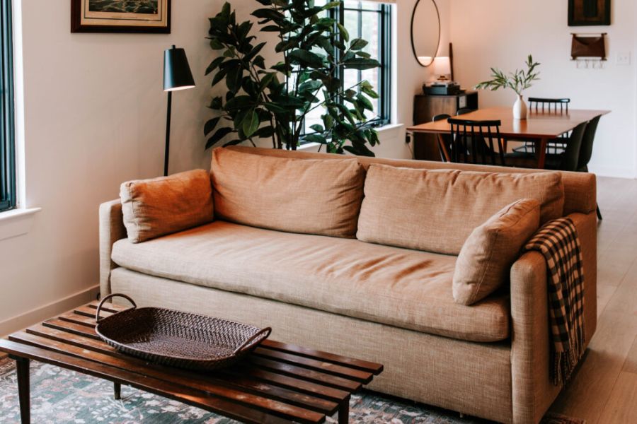 Sink into relaxation: this living room boasts a comfortable sofa that pulls out into a queen-sized bed, inviting you to unwind and enjoy moments of comfort and peace!