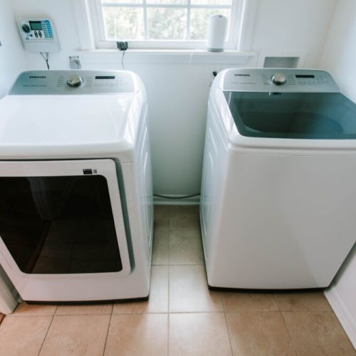 Just steps from the kitchen—but don’t worry, the only thing we’re cooking in here is fresh laundry!